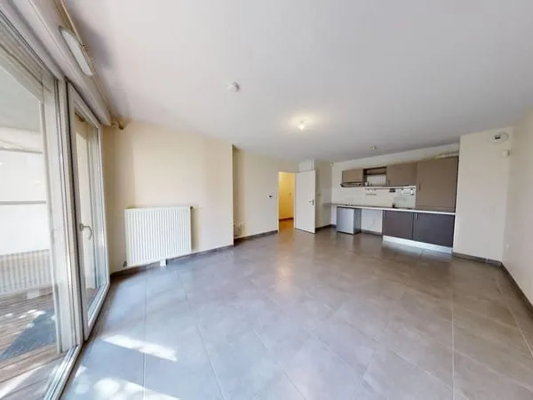 Appartement T2 46 m2 rez de jardin + parking sous sol