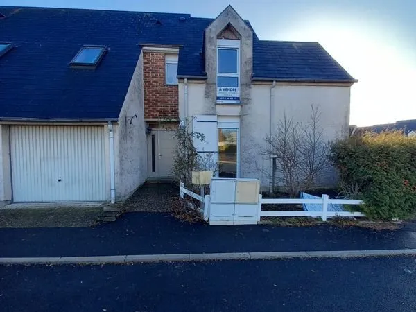 Maison de type 4 avec garage et jardin
