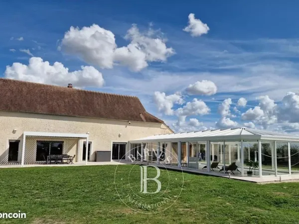 Maison 10 pièces 446 m²