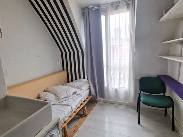 Chambre de bonne occupée - Quartier Maison Blanche