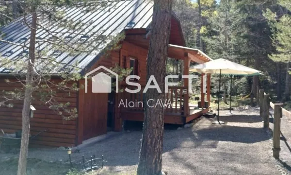 Chalet de 51m² sur 2 niveaux avec garages, vide sanitaire sur 552 m² de terrain cloturé