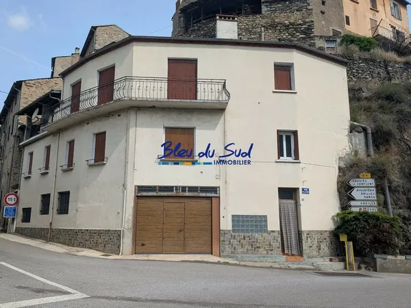 Maison composée de 2 appartements T3 avec grand garage / atelie