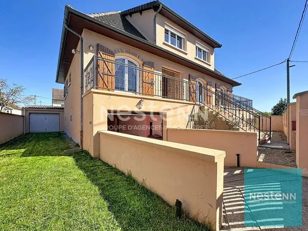 Maison familiale surélevée sur un sous-sol total avec jardin à Varennes-sur-Seine