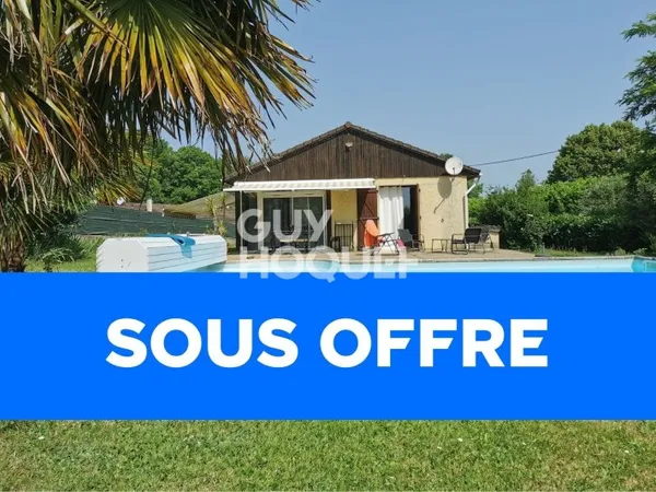 Maison de plain-pied avec piscine et grand terrain