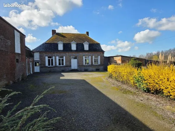 Maison avec granges - batiments - annexes et jardin