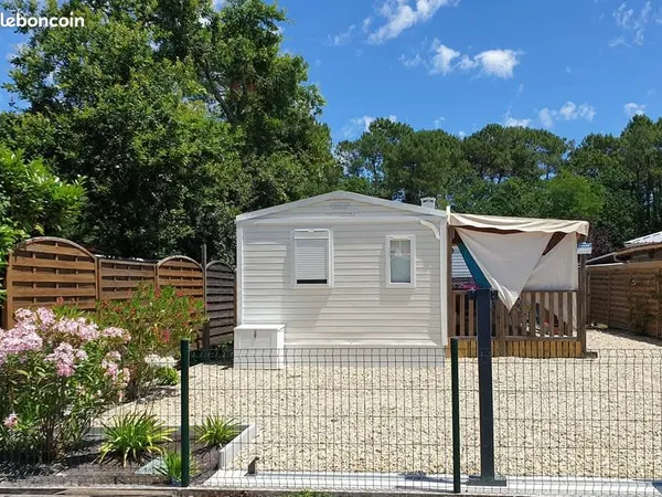 Mobil-home équipé +parcelle constructible