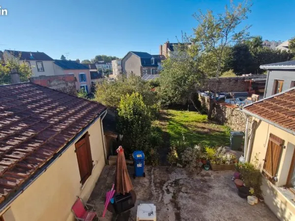 Immeuble de 4 appartements (investissement locatif) avec jardin de 200m2