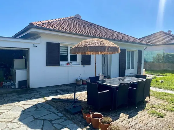 Maison de plain pied 78m2 avec garage et jardin