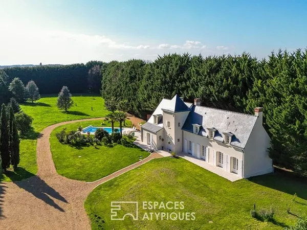 Propriété de charme avec piscine et parc paysager