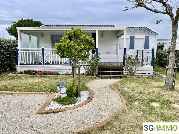 Mobilhome 2 chambres avec terrasse sud et jardin clos | Proche océan