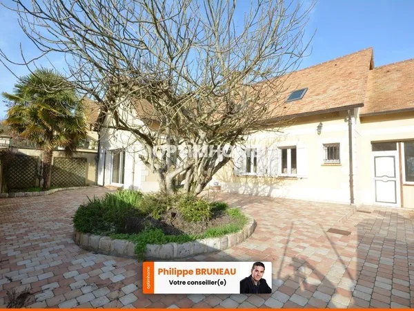Grande maison familiale avec potentiel professionnel intégré