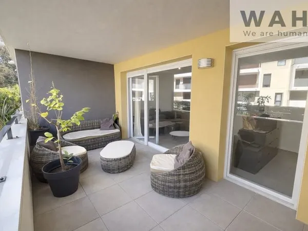 T2 avec terrasse et place de parking privative dans résidenc