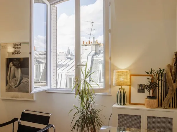 Loue appartement 65m² avec vue sur les toits de Paris - 2 chambres