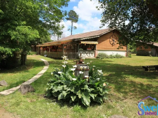 Local commercial de 139m² dépendance avec salle d'eau et WC su