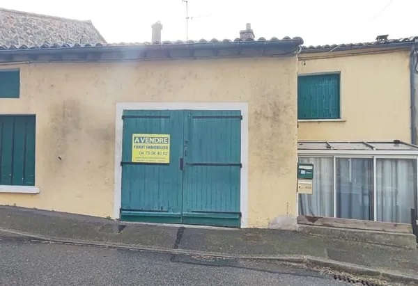 Maison divisée en 2 logements