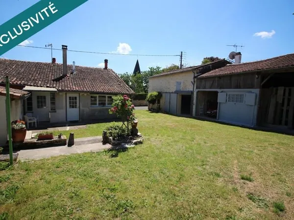 Maison 4 chambres prête à vivre , 2 garages et dépendances !