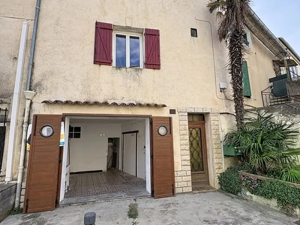 Maison de Village de Type 4 avec garage.