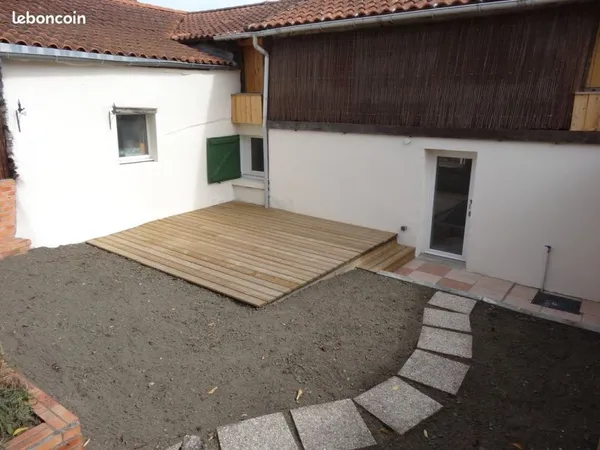 Logement 2 pièces avec jardin