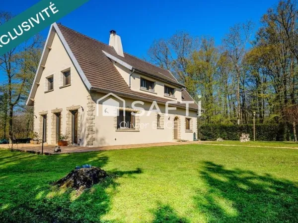 Belle maison dans son écrin de verdure