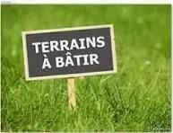Exclu Jcl Immobilier à Hoymille : Terrain à bâtir 409m², borné et non viabilisé, libre de constructe