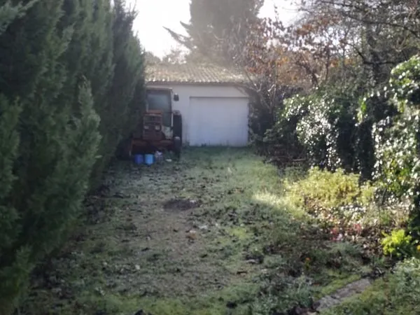 Garage avec terrain