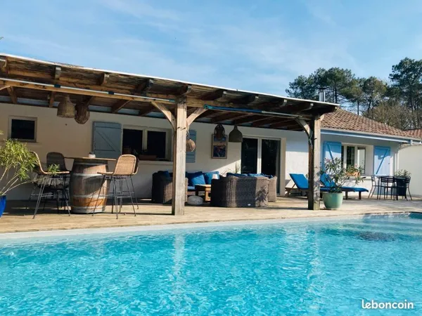 Maison plain pied avec piscine, grande terrasse et dépendance
