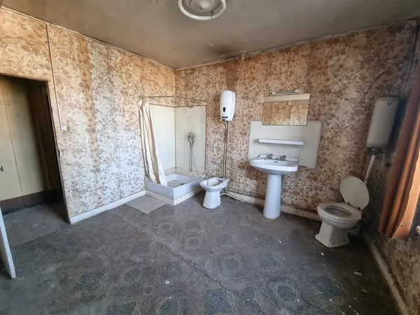 IMMEUBLE DE RAPPORT OU MAISON D'HABITATION