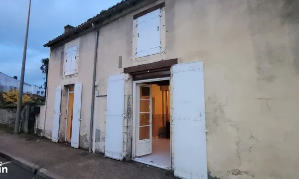 Maison mitoyenne en coeur de village