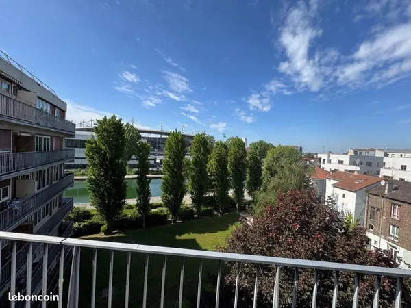Superbe 3P traversant avec balcon, vue canal & parking - 65m² - Saint-Denis