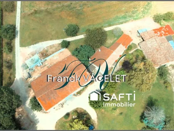 Propriété au centre de 14 Ha de terres