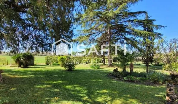 Maison en pierre sur un parc arboré de 4453 m2