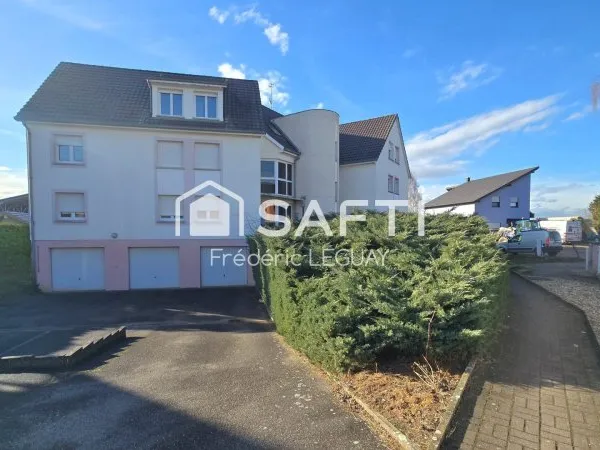Appartement au calme, avec jardin place de parking et garage