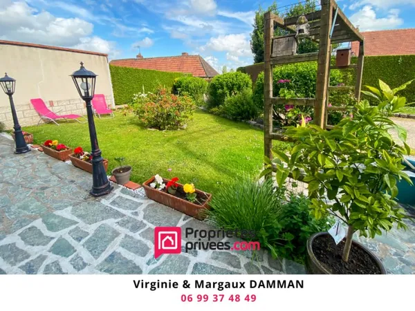 Thuit-Signol -Maison familiale en retrait de route avec jardin