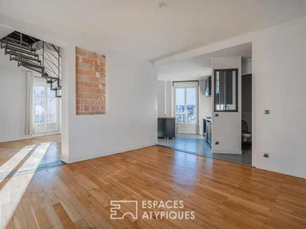 Duplex au centre ville en dernier étage avec vue montagnes