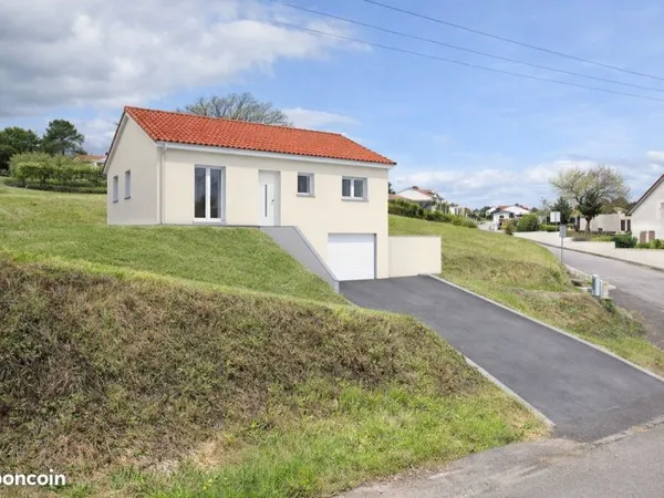 Terrain + maison à GANNAT