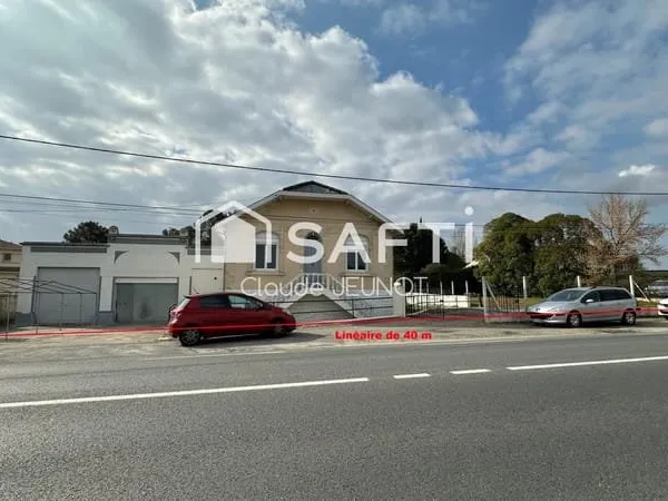 LOCAL COMMERCIAL avec MAISON sur 1000 M2 BORDURE ANCIENNE NATIONALE 10