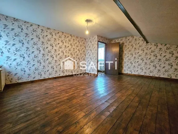 Maison individuelle de 3 chambres avec garage et grand terrain