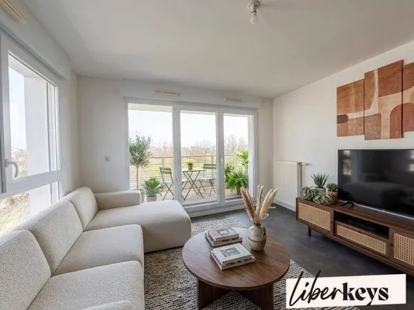 Appartement T4 lumineux avec balcon + parking sécurisé