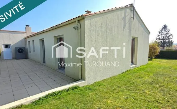 Pavillon plain-pied 96m², 3 chambres, 570m² de terrain + garage.