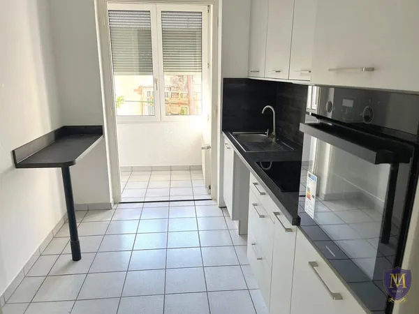 SAINT-LOUIS CENTRE APPARTEMENT 3 PIÈCES AU REZ-DE-CHAUSSÉE D