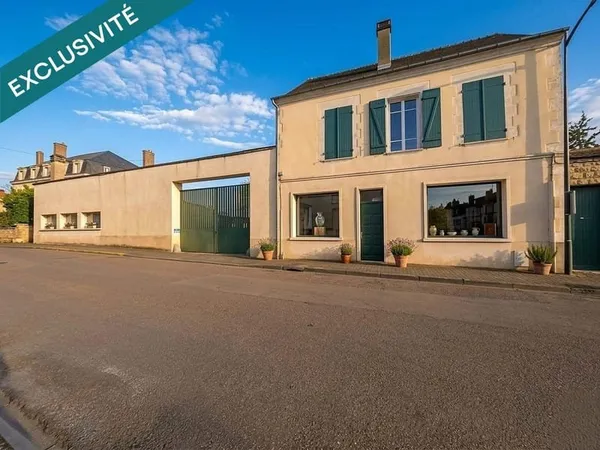 Ensemble immobilier composé de 4 appartements et 300 m² de murs commerciaux LIBRES + jardin