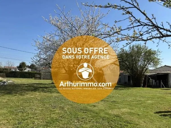 Terrain 930m² avec garage à Vallans