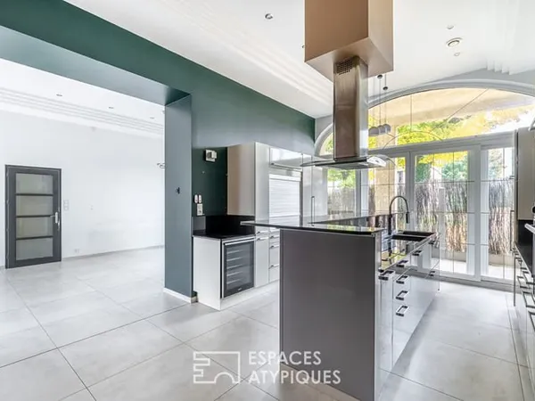 Appartement en rez-de-chaussée avec terrasse, stationnement et garage