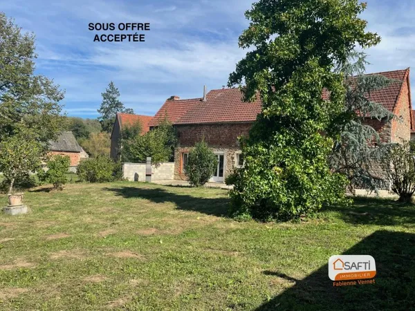 Ancien corps de ferme à rénover avec dépendances et terrain arboré