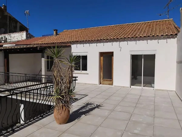 Appartement rénové 4 pièces avec grande terrasse et garage