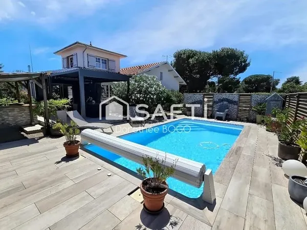 Maison 4 chambres + garage + piscine