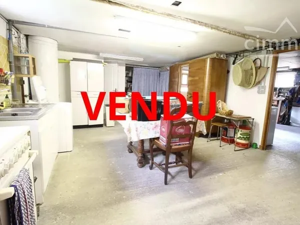 VENDU une villa avec un jardin et un grand garage