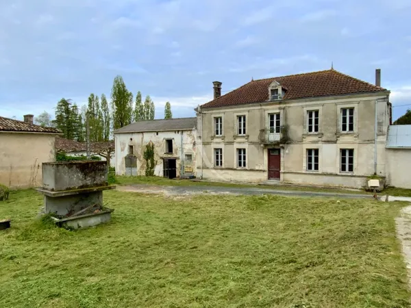 Maison en pierre 162 m2 + dépendances