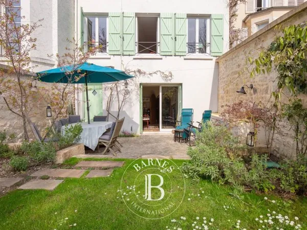 A vendre - Coeur de ville - Appartement de charme en rez-de-jardin