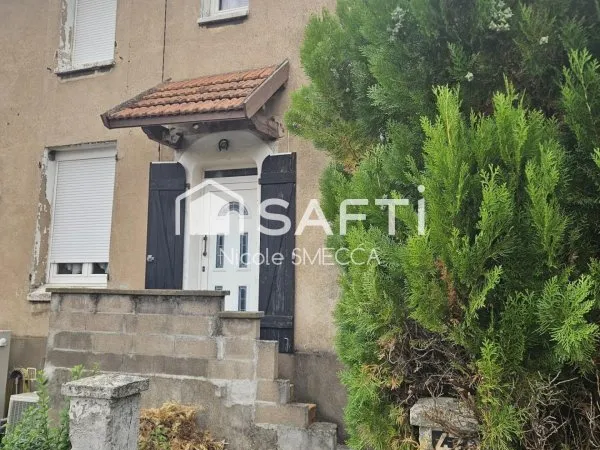 Maison mitoyenne 4 pièces,2 chambres,garage,jardin